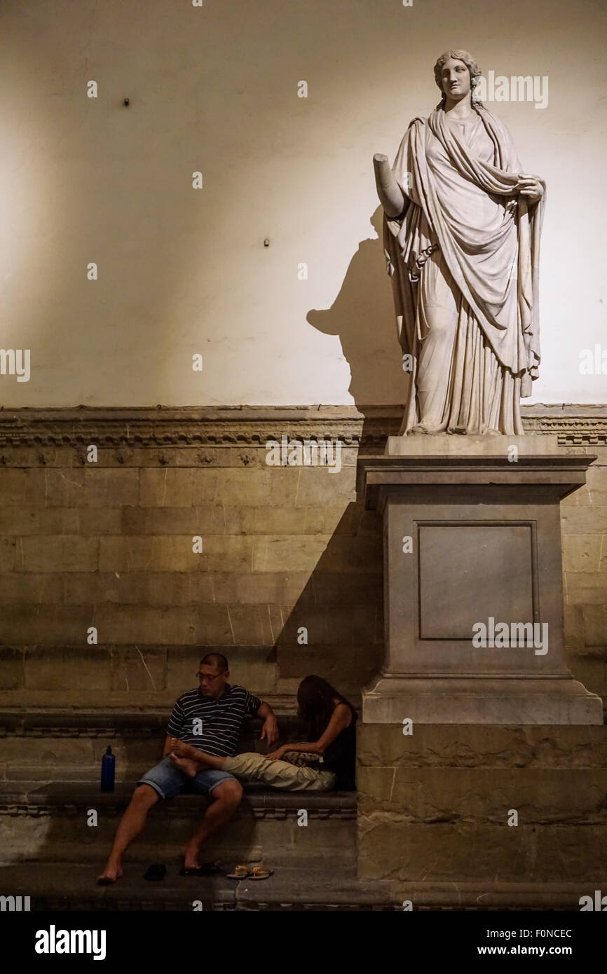 Paar erholsame auf der Piazza Signoria Stockfoto