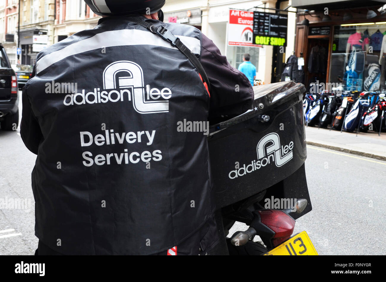 Addison Lee Zustelldienste Auslieferungsfahrer und Fahrrad Stockfoto