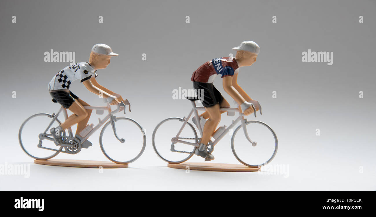 Miniatur-Spielzeug-Rennfahrer Stockfoto