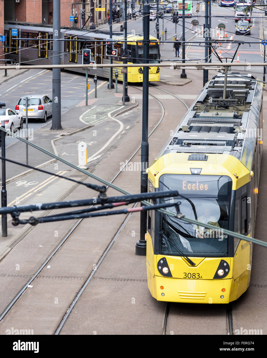 Metrolink Straßenbahnen, die Teil des öffentlichen Verkehrssystems in Manchester, England, Großbritannien Stockfoto