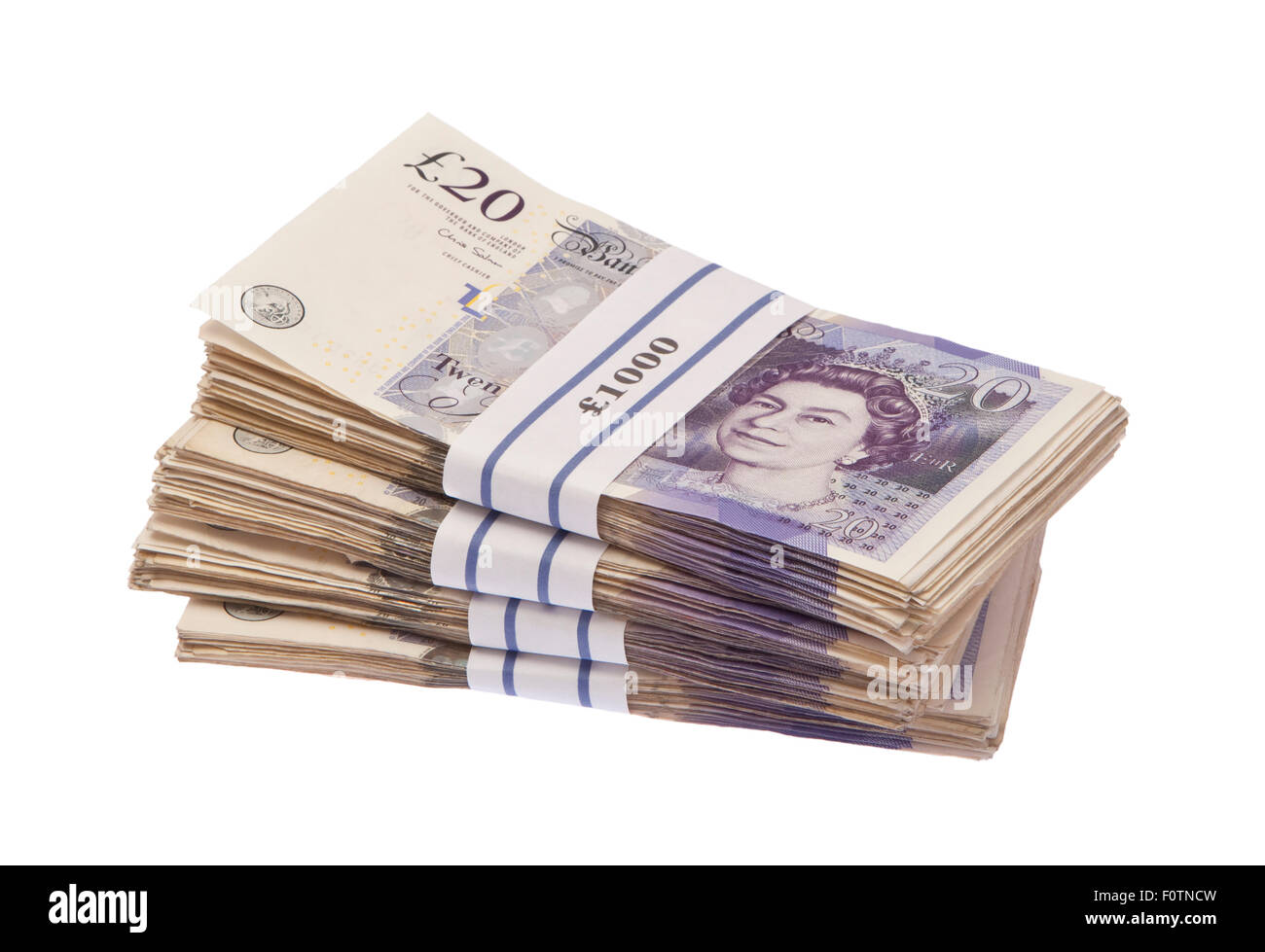Isolierte Haufen von zwanzig Pfund Banknoten in tausend Pfund bündeln Stockfoto