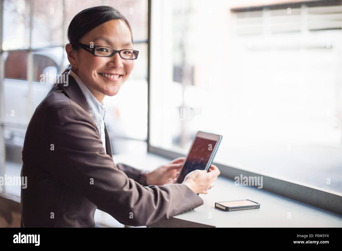 Geschäftsfrau mit digital-Tablette Stockfoto