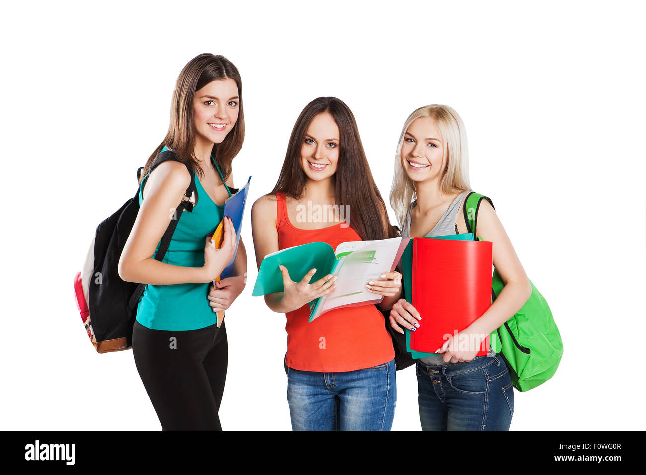 Bildung-Zeit für drei Teenager-Studentin Freundinnen mit Schulbüchern. Stockfoto