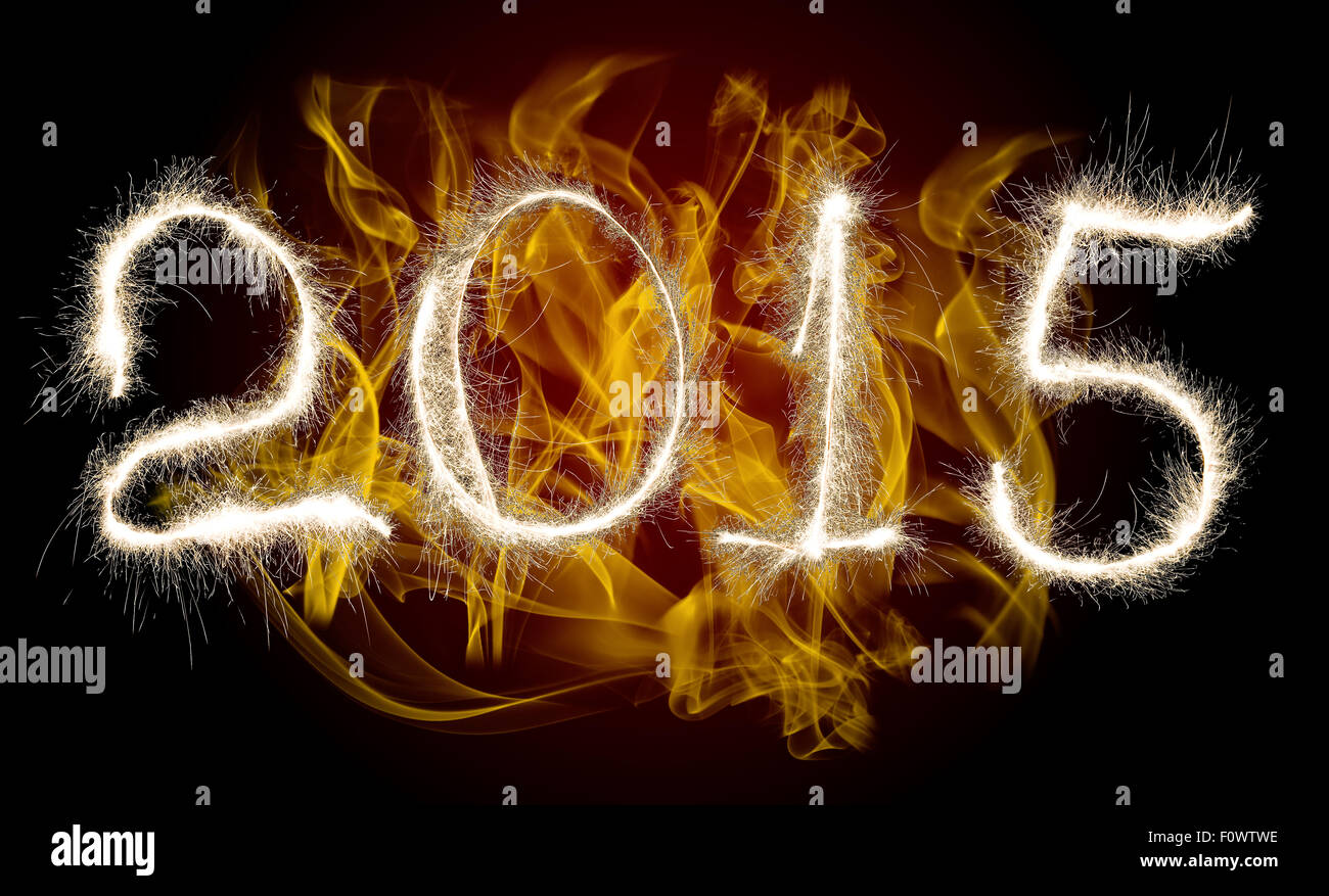 Datum Neujahr 2015 von Foto funkeln Bengal Licht auf Hintergrund mit Flamme, Collage aus Abbildung Stockfoto