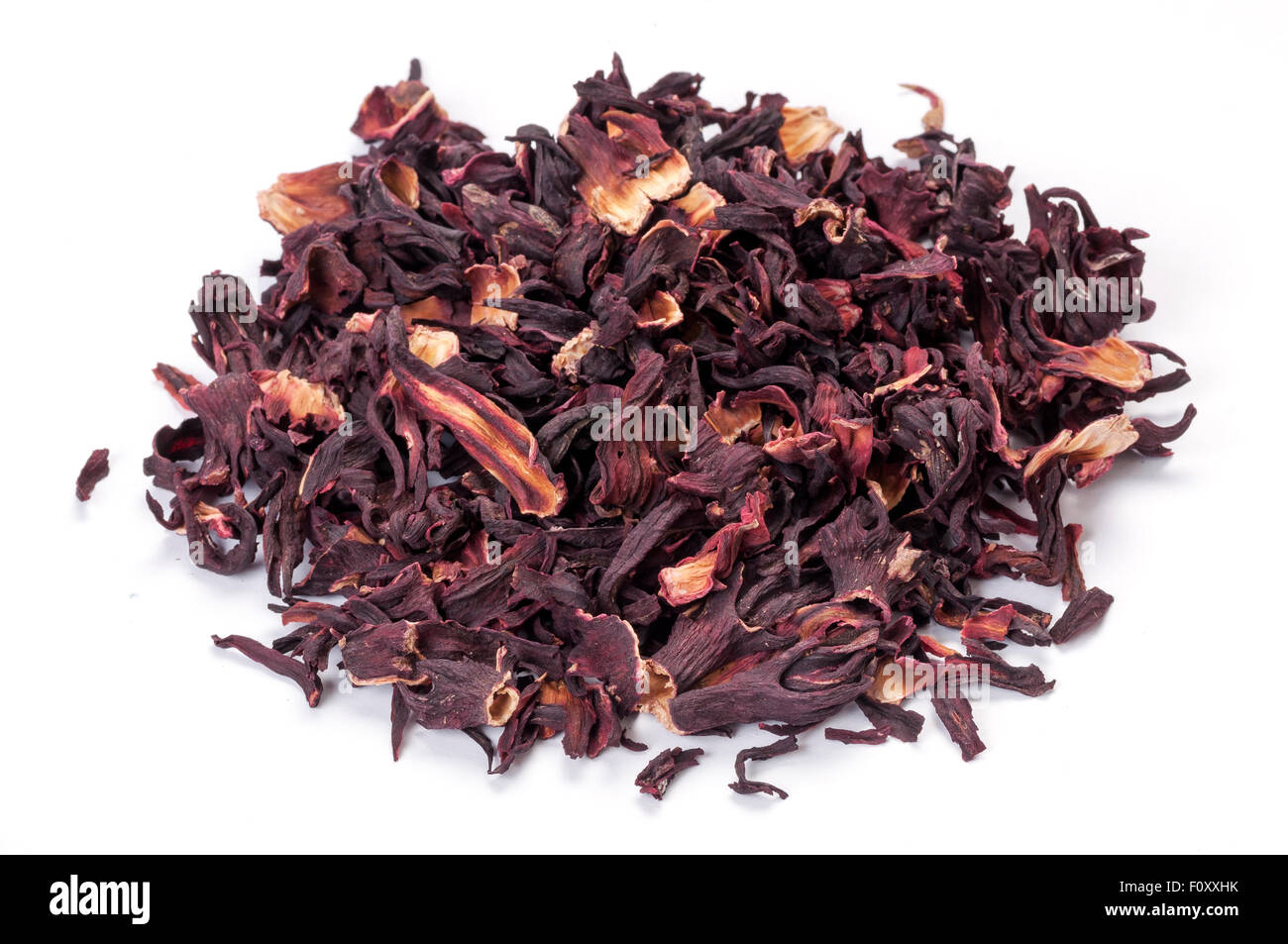 Haufen von Hibiskustee auf weiß mit Schatten Stockfoto