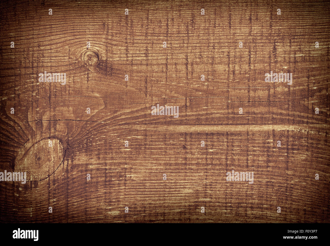 Dunkelbraun zerkratzt Holzbrett. Holzstruktur Stockfoto