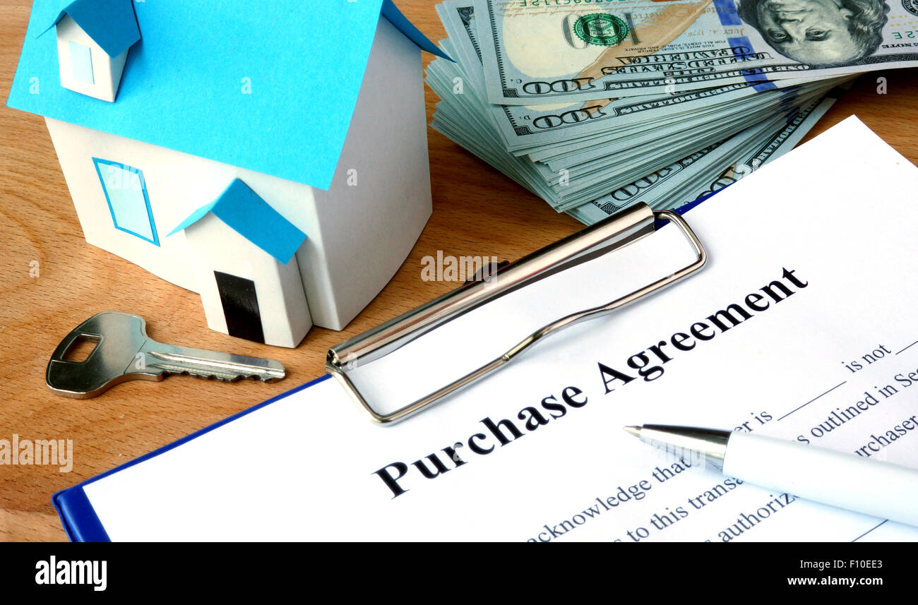 Einkaufsbeleg Vereinbarung mit US-Dollar und home Modell. Stockfoto