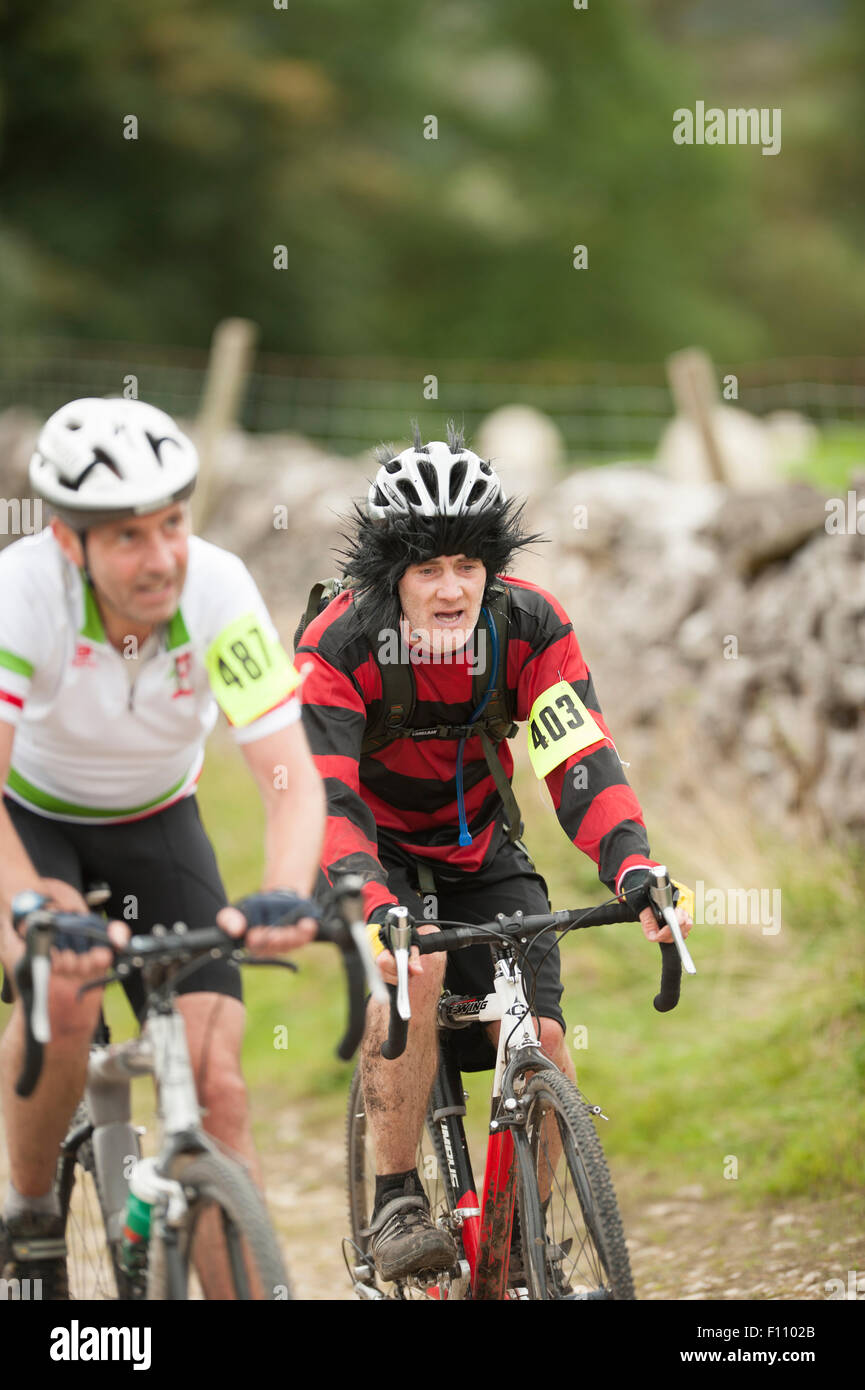 "Dennis the Menace" reitet der drei Zinnen-Cyclocross Stockfoto