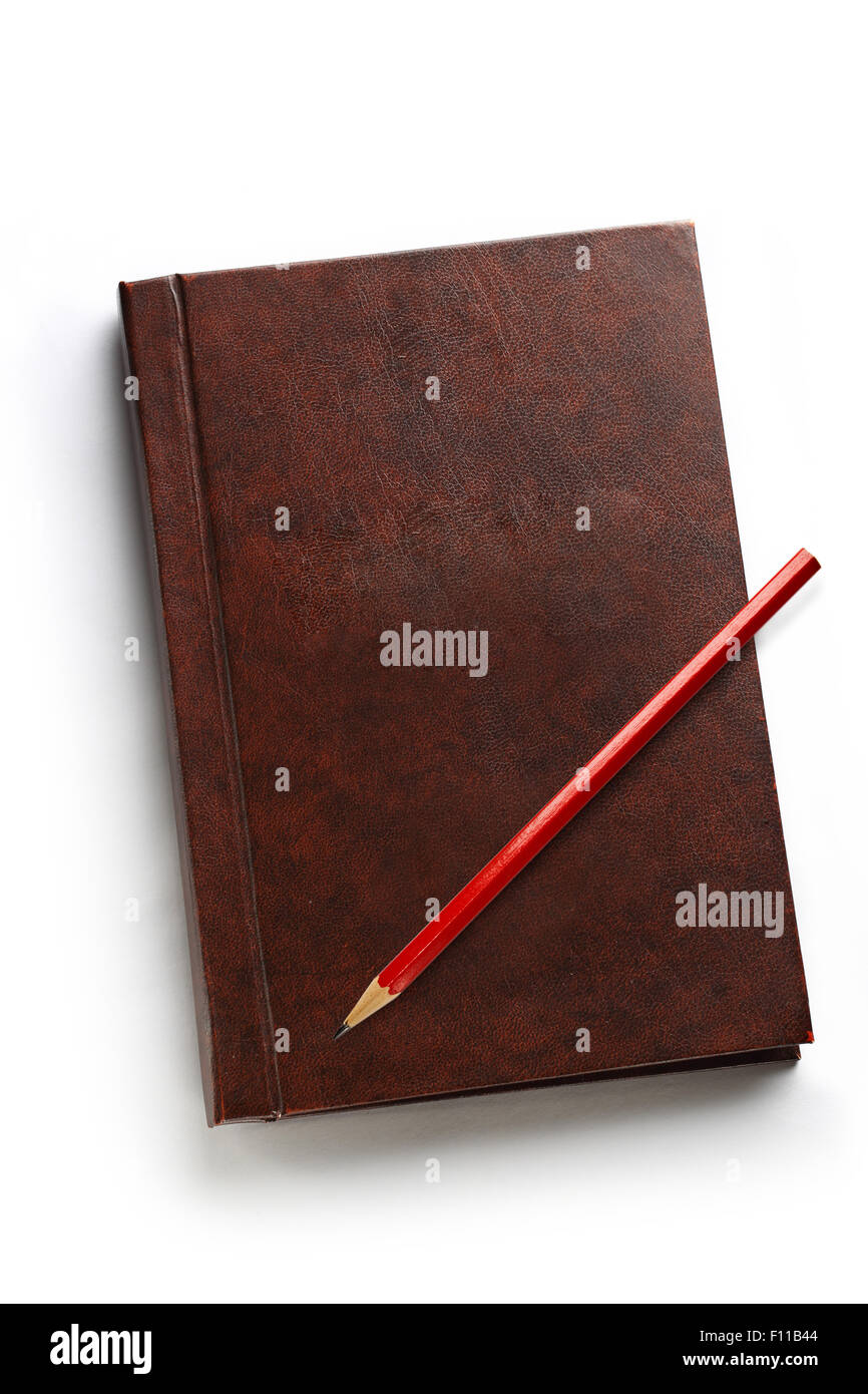 Dunkle Leere Notebook mit rotem Stift drauf Stockfoto