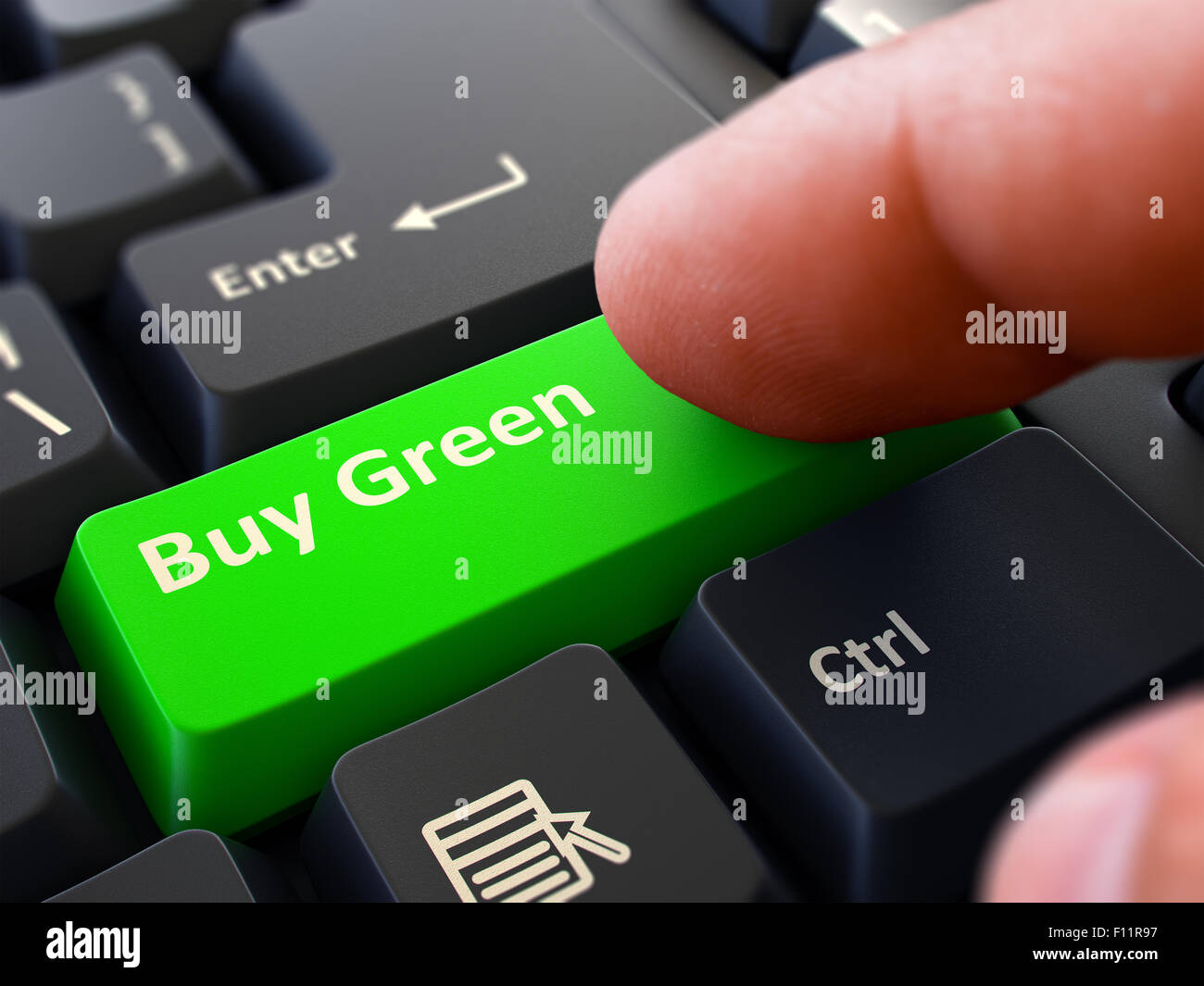 Kaufen Sie grüne Konzept. Person Tastatur klicken. Stockfoto