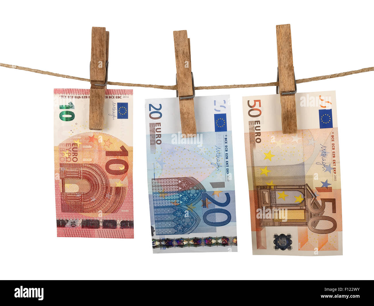 Euro-Banknoten auf der Wäscheleine trocknen Stockfoto