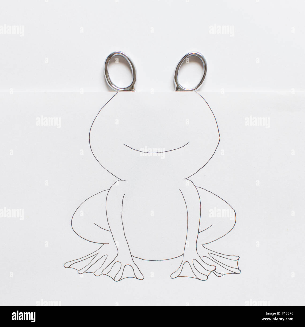 Konzeptionelle Zeichnung eines lächelnden Frosch Stockfoto