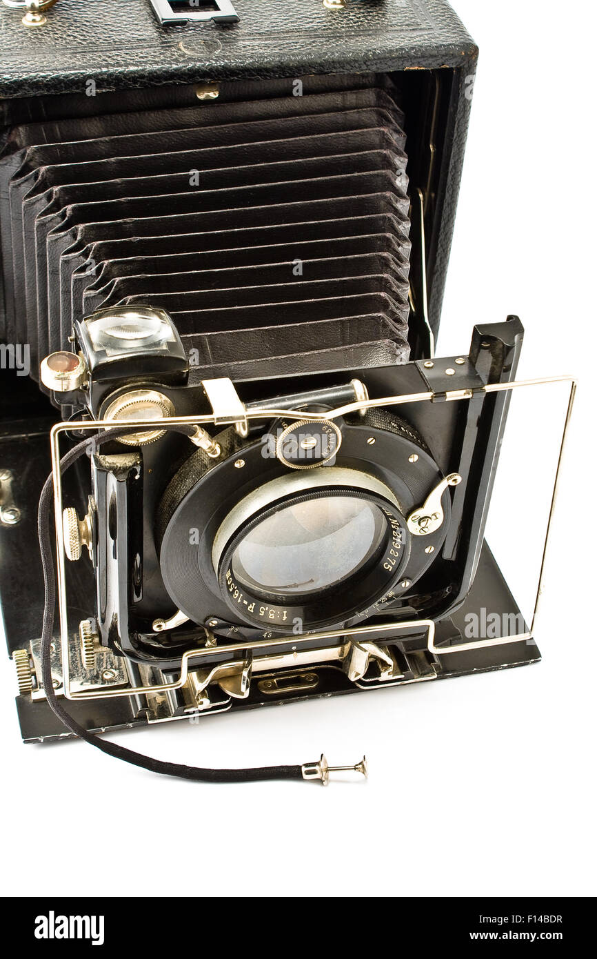 Antikes altes Foto Kamera isoliert auf weiss Stockfoto