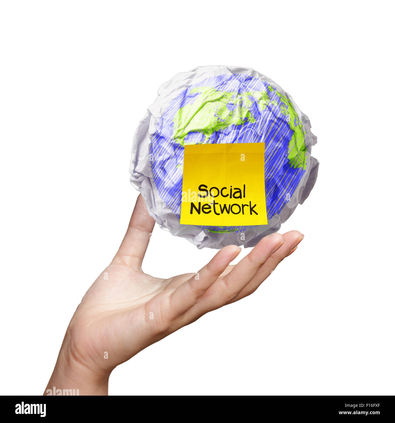 Hand zeigen zerknitterte Welt und Sozialnetz Notiz als Konzept Stockfoto