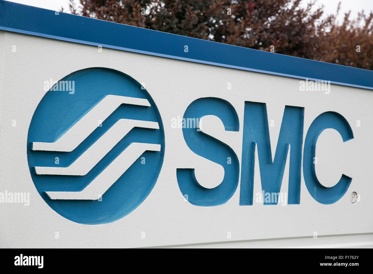 Ein Logo Zeichen außerhalb einer Einrichtung, die von den SMC Corporation of America, in Noblesville, Indiana am 15. August 2015 besetzt. Stockfoto