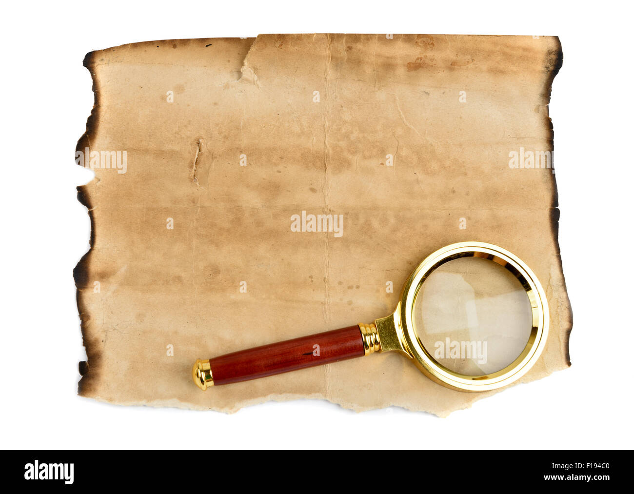 Bogen mit alten Grunge leeres Papier mit Vergrößerung Glas Stockfoto