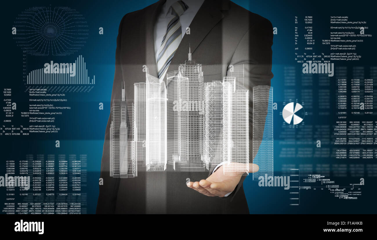 Geschäftsmann mit 3d Stadtmodell und Grafiken Stockfoto
