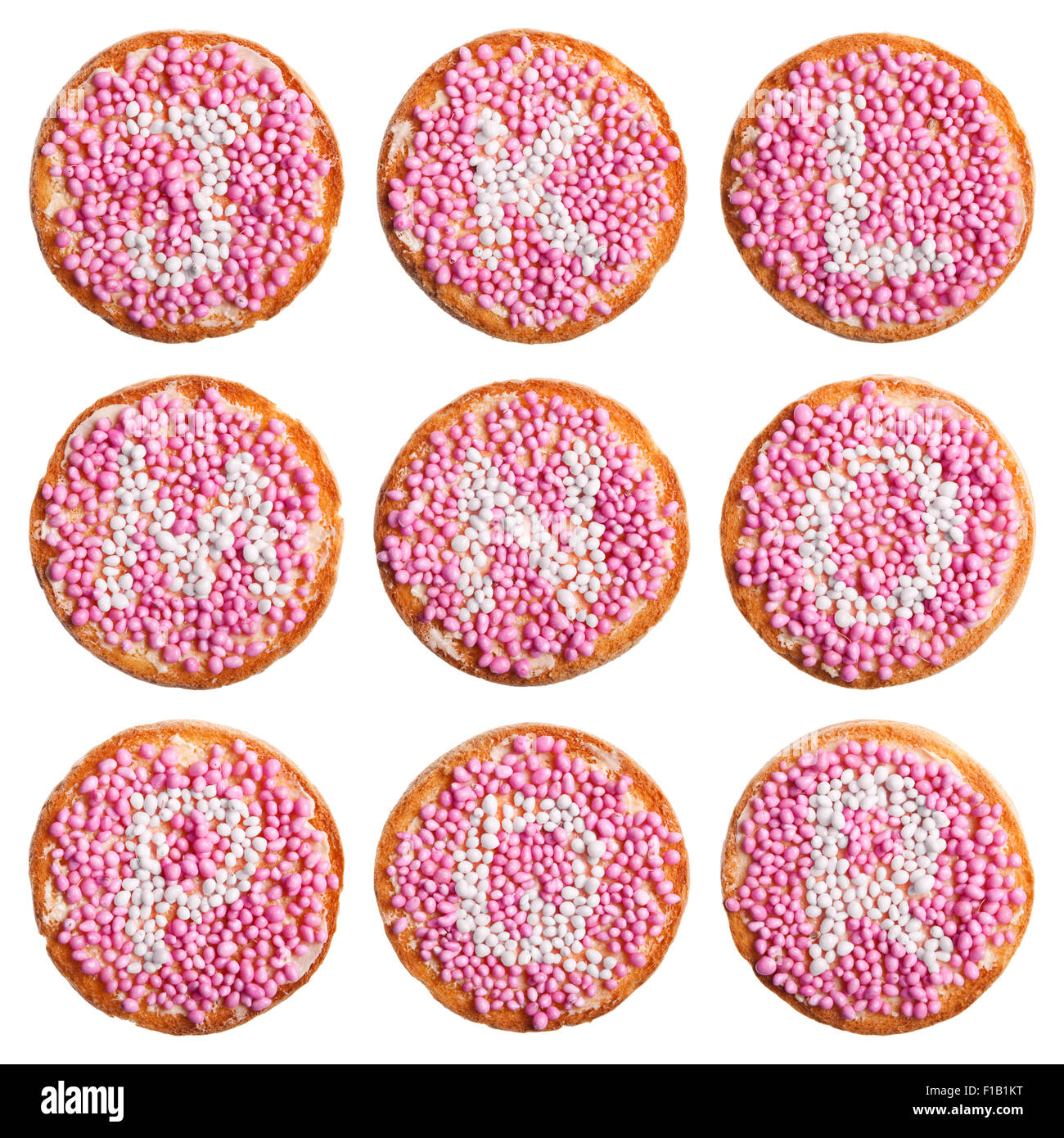 "Beschuit met Muisjes", eine traditionelle Behandlung zur Feier der Geburt eines Kindes in den Niederlanden. Rosa für ein Mädchen. Stockfoto