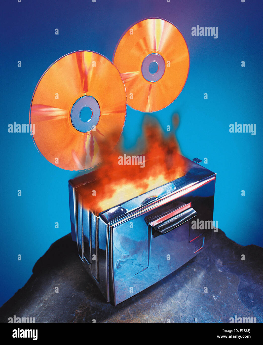 Hamburg, Deutschland, CD-Roms Mauszeiger brennenden toaster Stockfoto