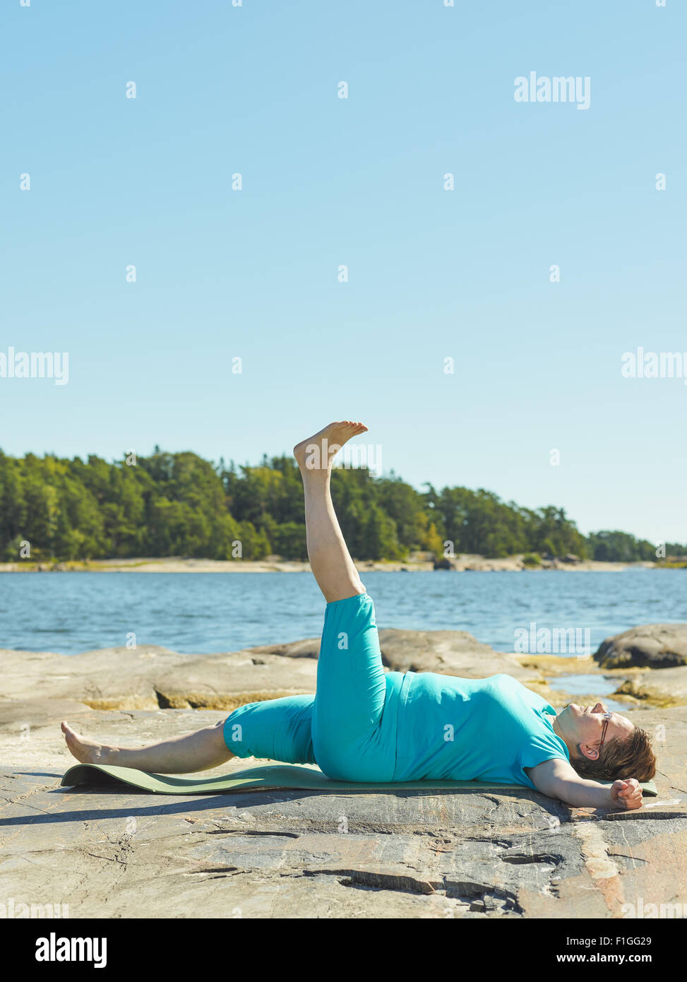 Real-Life Fitness-Training, Reife Frau, training im freien - vertikal Format Bild Stockfoto