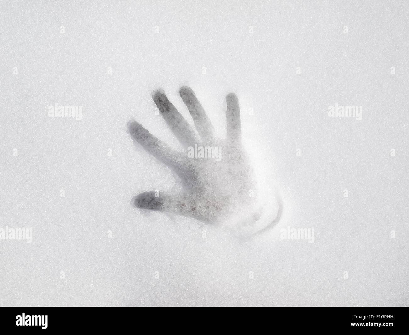 Handprint isoliert im Schnee Stockfoto