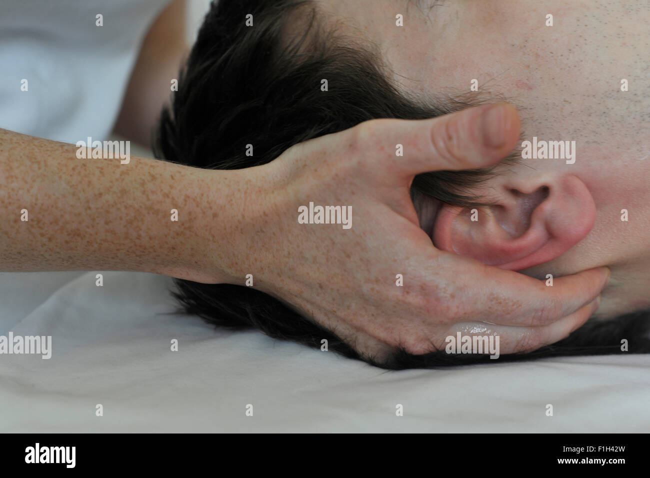 Hände, Kopf Stockfoto