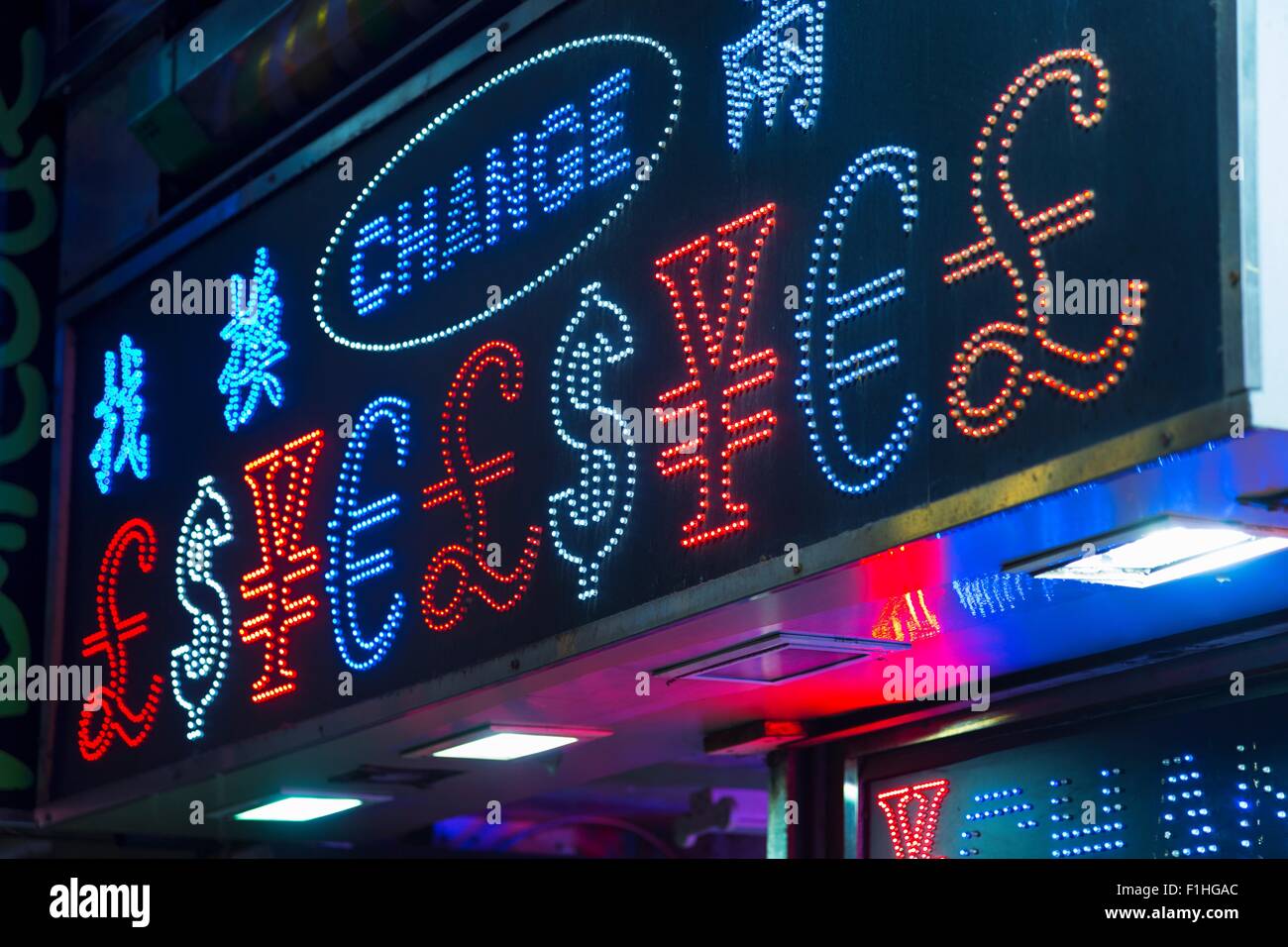 Beleuchtete Wechselstube Zeichen, Hong Kong, China Stockfoto