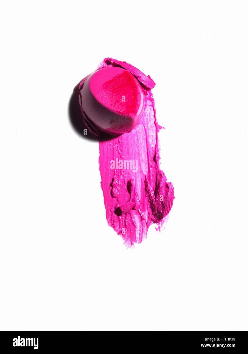 Auszug aus Stück rosa Lippenstift und Mascara-Fleck Stockfoto