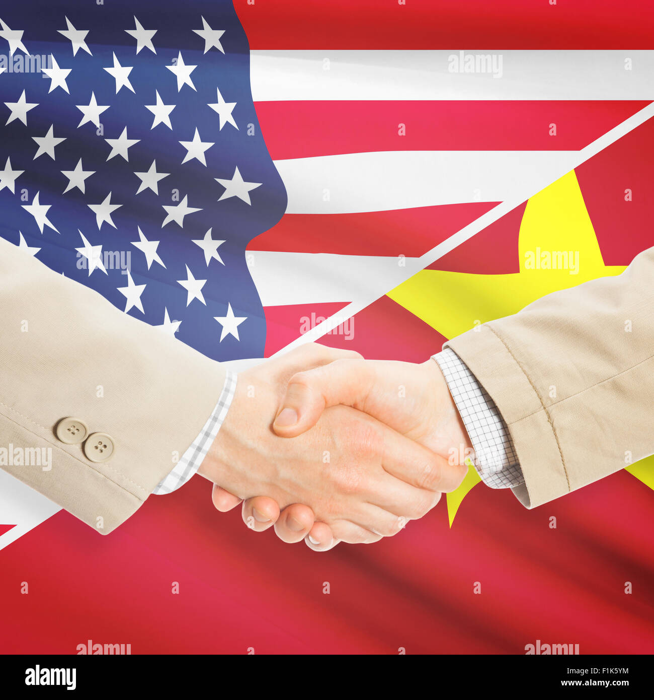 Geschäftsleute Händeschütteln - USA und Vietnam Stockfoto