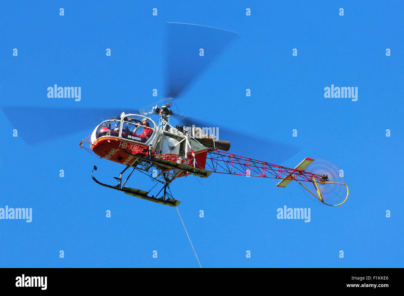 Schweizer Aérospatiale SA 315B Lama Rettungshubschrauber der Air-Glaciers auf der Flucht in den Alpen, Schweiz Stockfoto