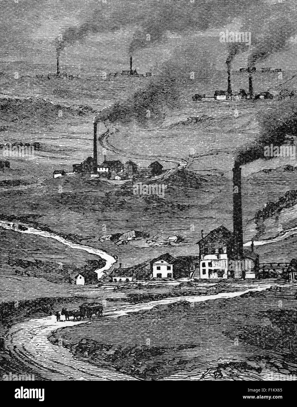 Ein Blick aus dem 19. Jahrhundert auf den Yorkshire Colliery District in England und die anhaltende Luftverschmutzung. Der Kohlehandel expandierte in den 1840er und 1850er Jahren, als das britische Eisenbahnsystem wuchs und der Transport die Verteilung der Kohle verbesserte, um den Handel weiter anzukurbeln. Stockfoto