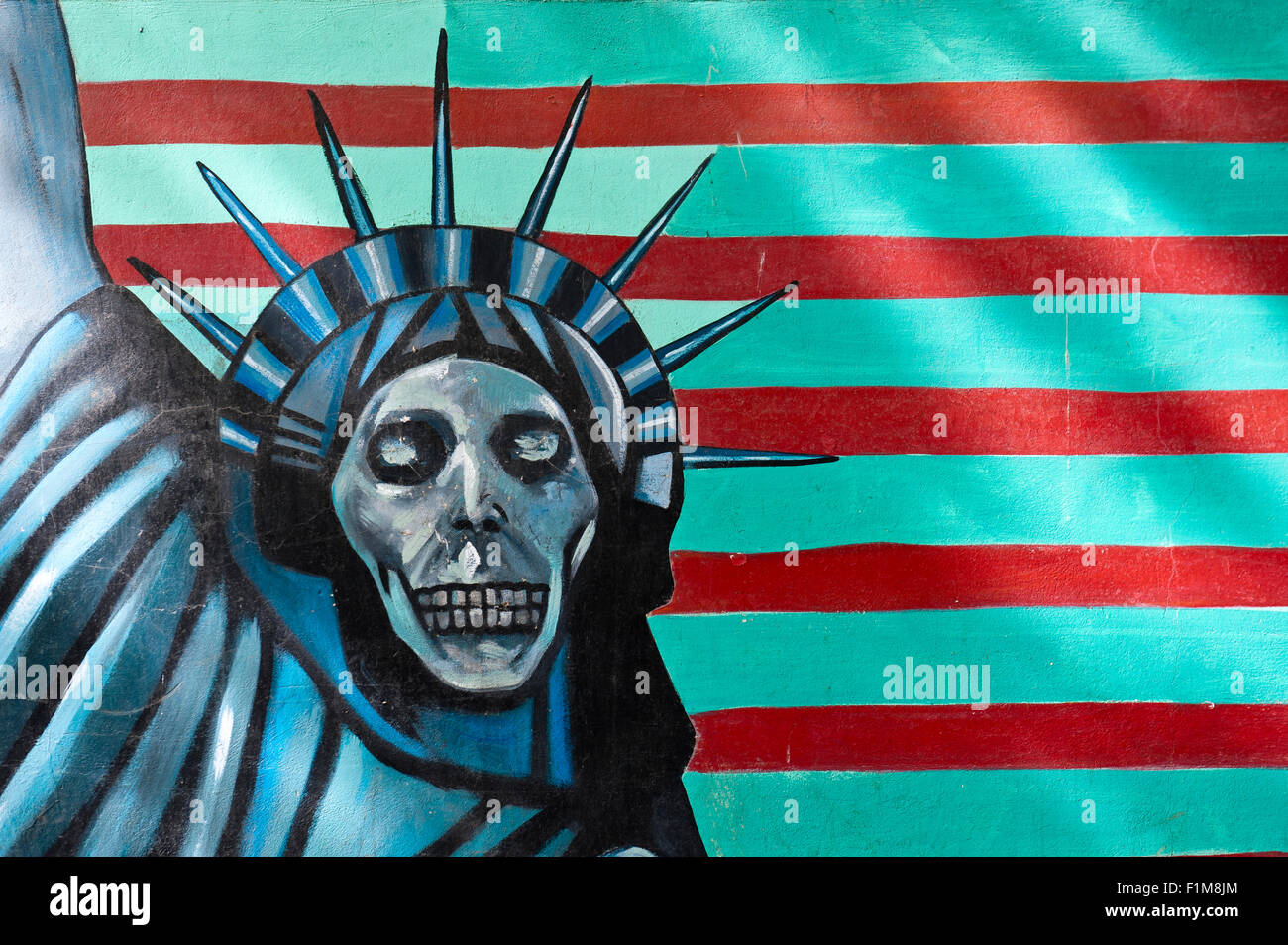 Graffiti an der Wand, symbol, Statue of Liberty mit einem Totenkopf, ehem. Botschaft der Vereinigten Staaten von Amerika in Teheran, Iran Stockfoto