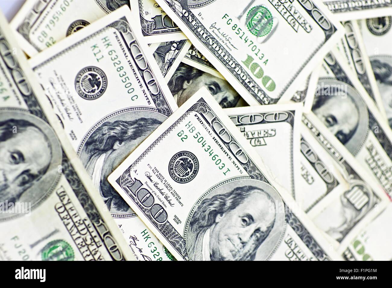 Bargeld-Hintergrund. Hundert Rechnungen in Bar. Tausende von amerikanischen Dollar Hintergrund. Stockfoto