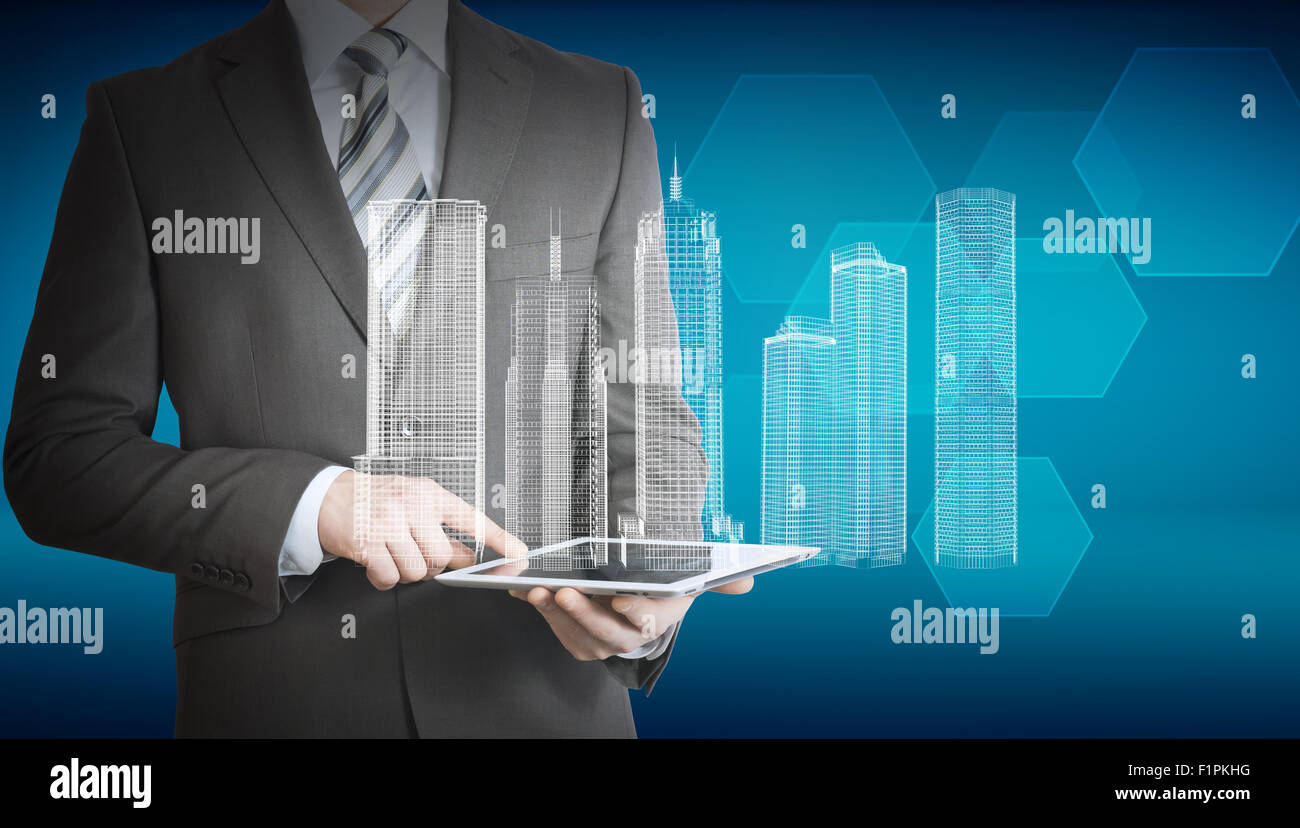Geschäftsmann mit Tablet mit 3d Modell der Stadt Stockfoto
