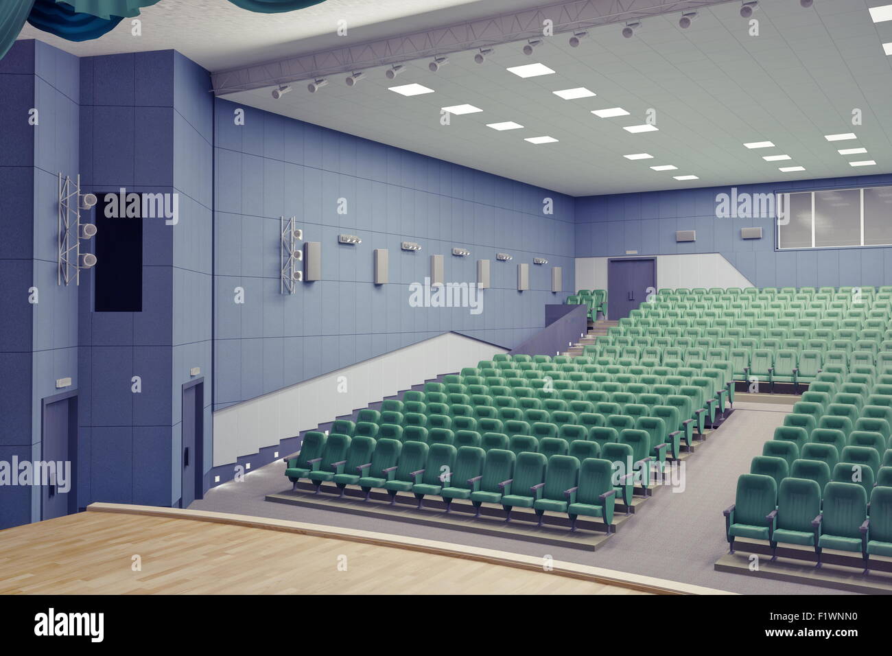 leere grüne Sessel im modernen Theater Halle Stockfoto