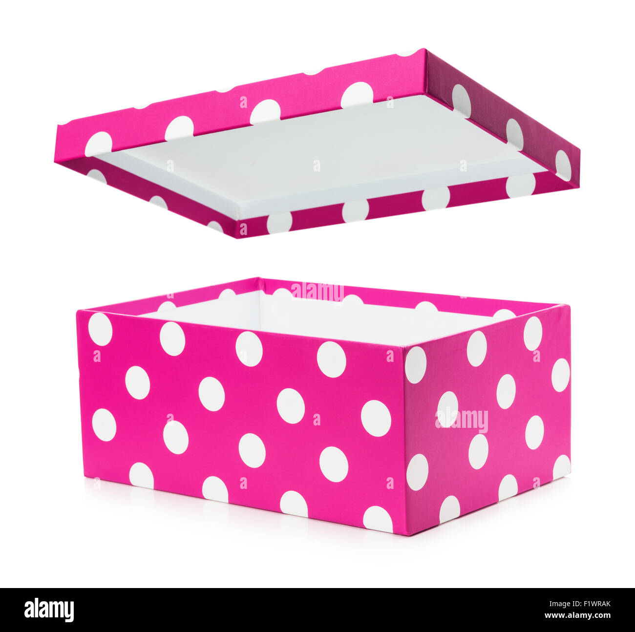 Rosa Geschenkbox mit weißen Tupfen. Stockfoto