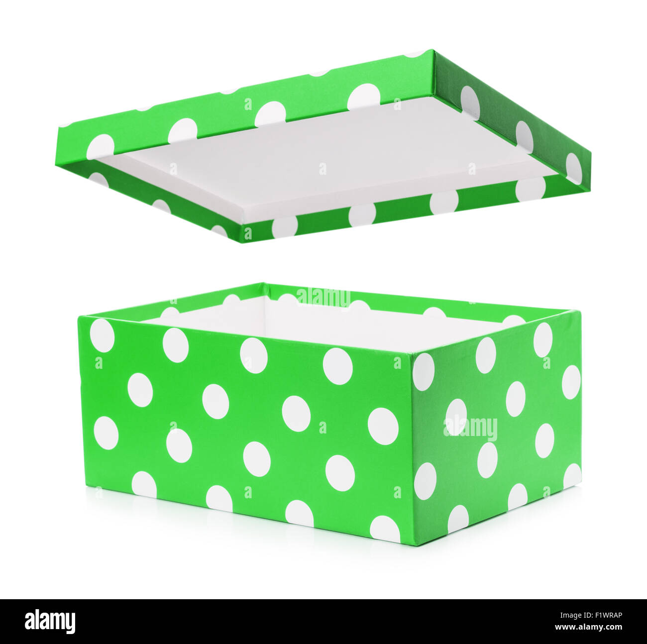 grüne Geschenkbox mit weißen Tupfen. Stockfoto
