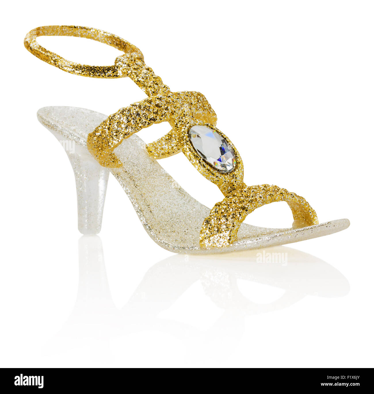 Goldene Dekoration Schuh auf dem weißen Hintergrund isoliert. Stockfoto