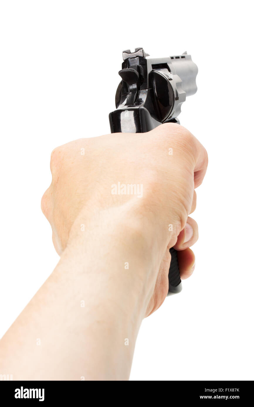 Revolver Pistole in der Hand auf dem weißen Hintergrund. Stockfoto