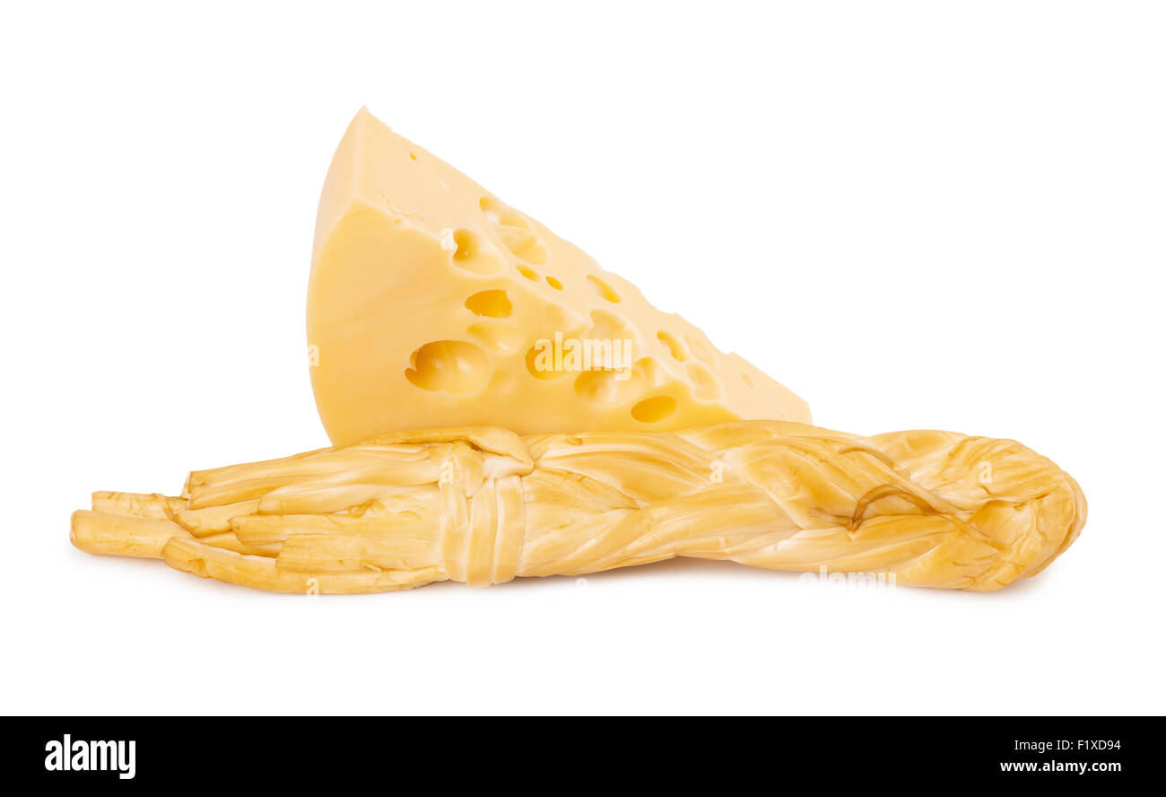 Stück Käse und Käse geflochten. Stockfoto
