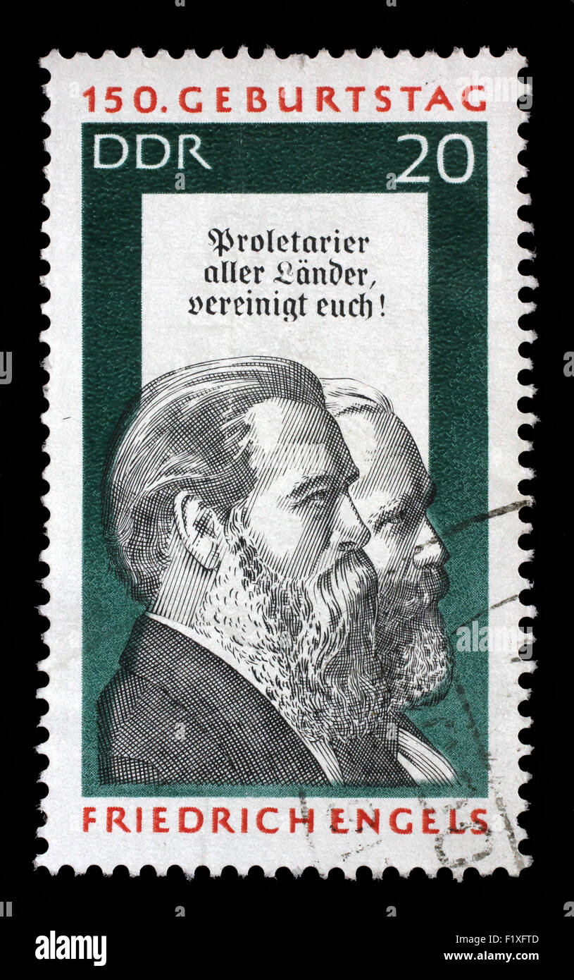 Gedruckt in DDR Stempel zeigt Friedrich Engels und Karl Marx, Sozialwissenschaftler, politischer Theoretiker und marxistischen, ca. 1970 Stockfoto
