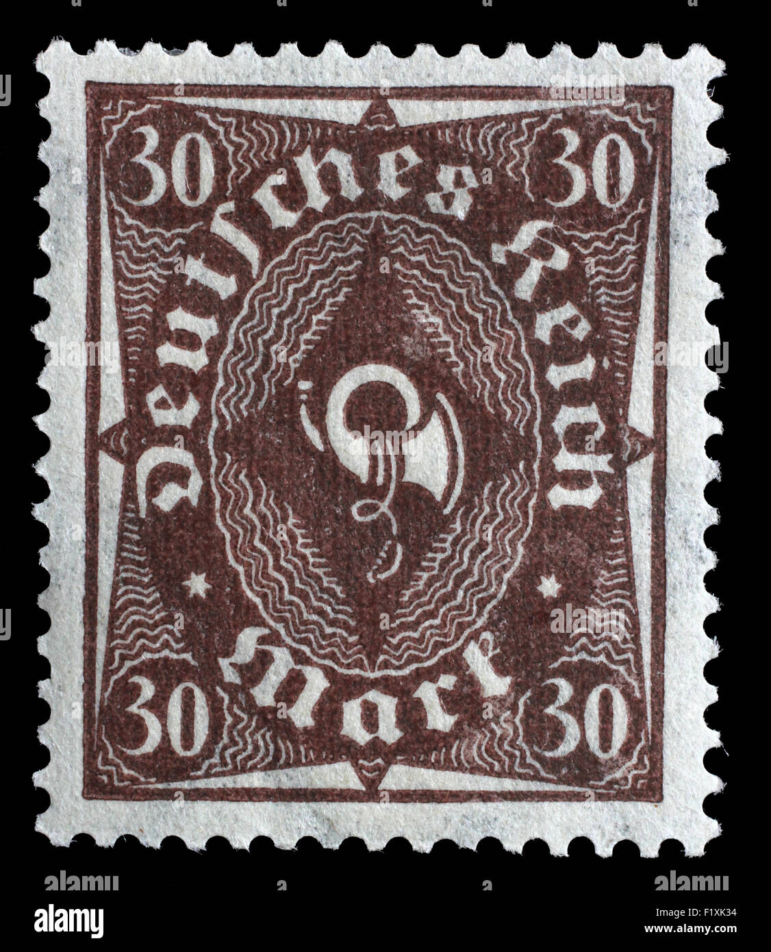 Gedruckt in Deutschland Stempels zeigt ein Posthorn, ca. 1922. Stockfoto