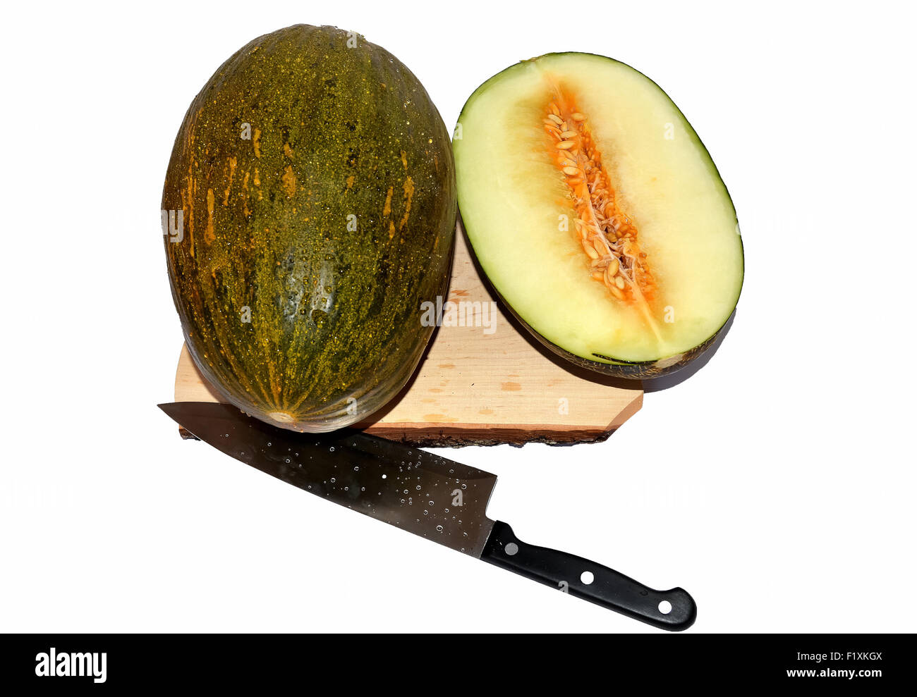 Ganze und geschnittene Melone Stockfoto