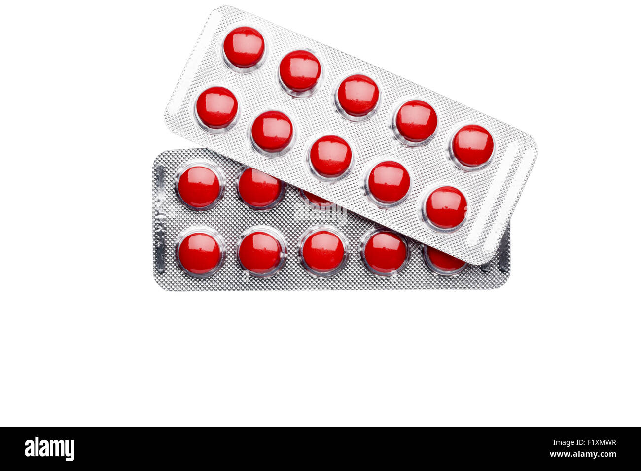 Zwei blister Packung rote Pillen isoliert auf weißem Hintergrund Stockfoto