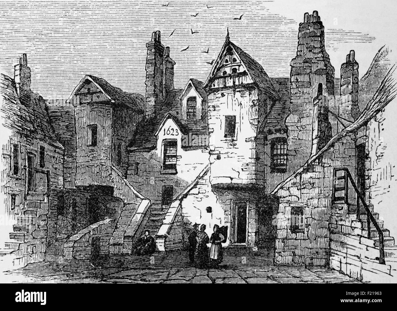 Originalwohnung im Weissen Pferd in der Nähe, am Fuße des Canongate, Edinburgh, Schottland. Das Gasthaus, erbaut im frühen 17th. Jahrhundert, war an der Stelle des ‘Stoppit Stravaig’ im Jahr 1639. Eine Zeit religiöser Unruhen, in der viele in Schottland in offener Rebellion gegen König Karl I. waren, hatte sich eine Gruppe schottischer Adliger im Gasthaus versammelt, bevor sie sich aufmachen, um mit dem König zu verhandeln. Aber presbyterianische Minister hörten von der geplanten Reise und ermutigten einen Mob von Stadtvolk, erfolgreich in das Gasthaus zu belagern und die Gruppe am Verlassen zu hindern. Stockfoto