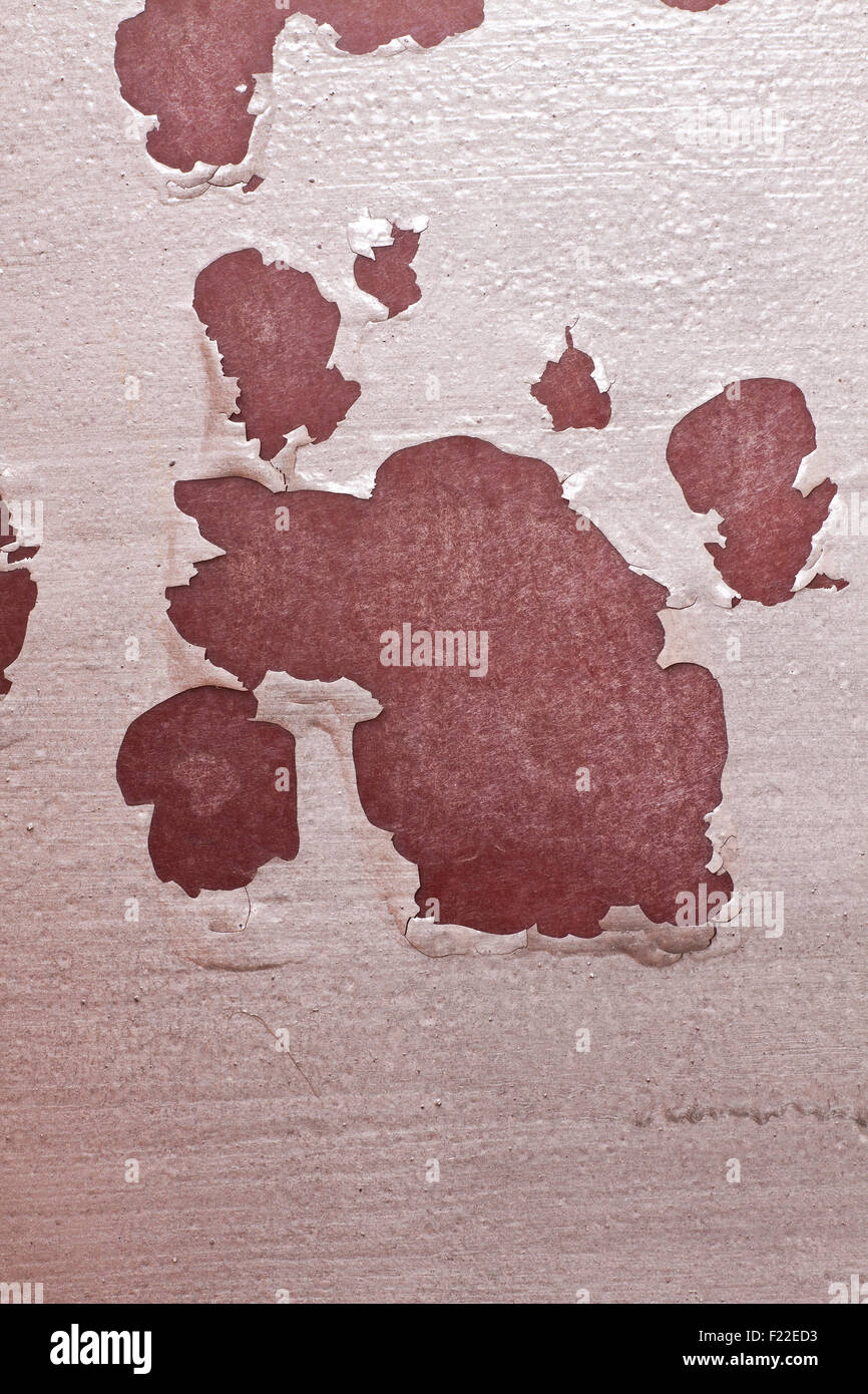 Abblätternde Farbe auf der Oberfläche des braunen Basis Stockfoto