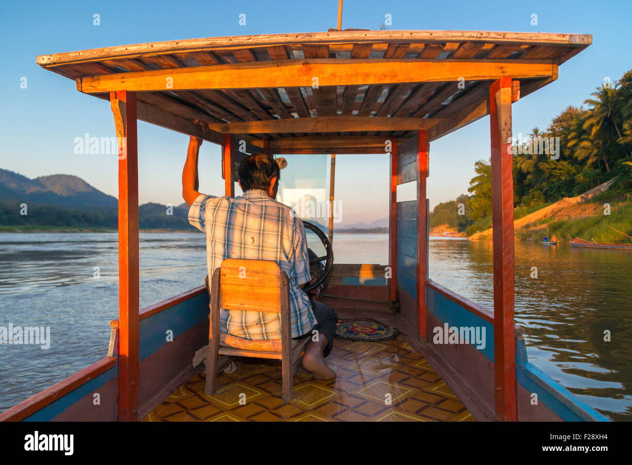 Riverboat-Kapitän am Mekong River, Luang Prabang, Laos Stockfoto