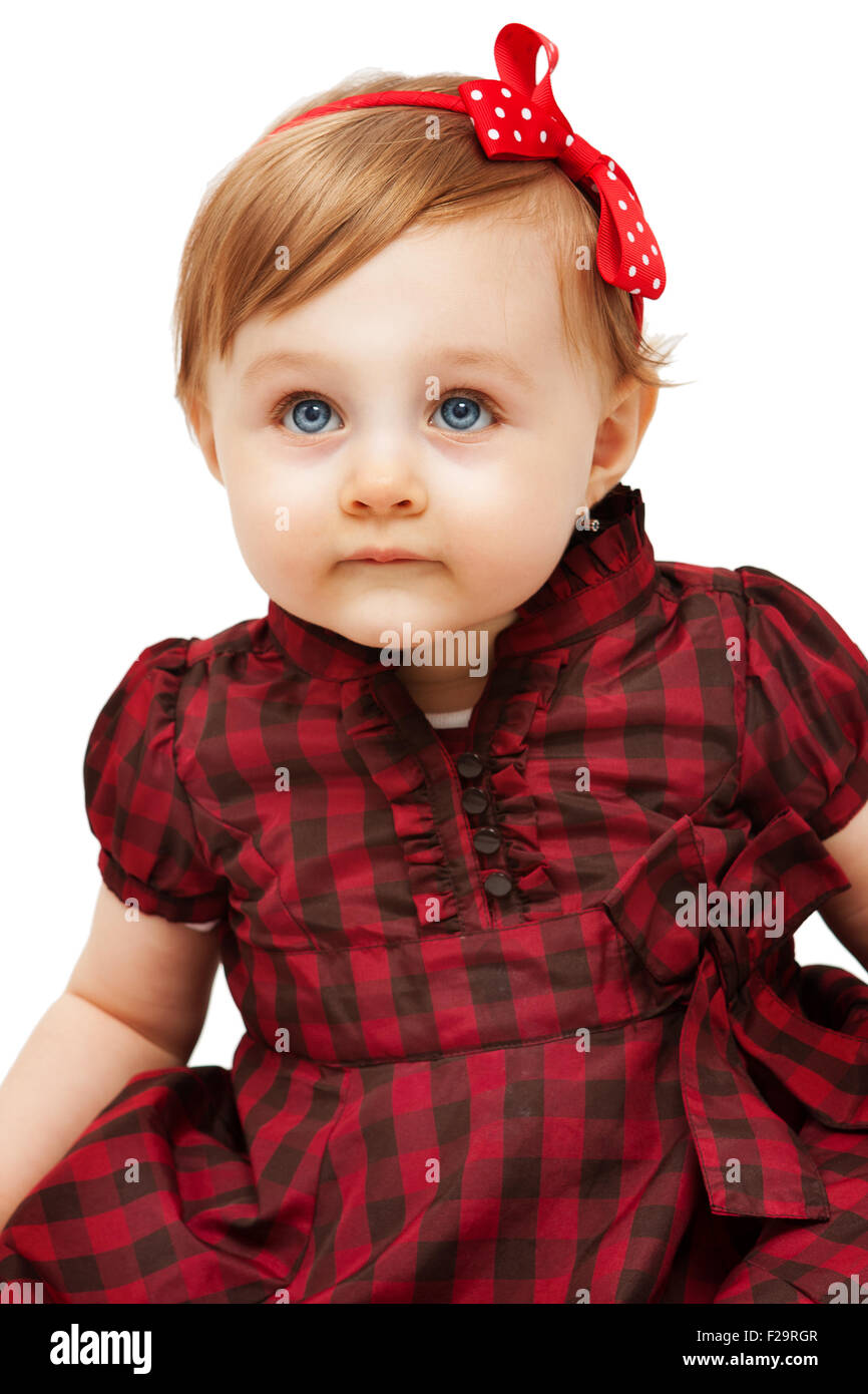 Wunderschönes kleines Mädchen mit blauen Augen, isoliert auf weiss Stockfoto