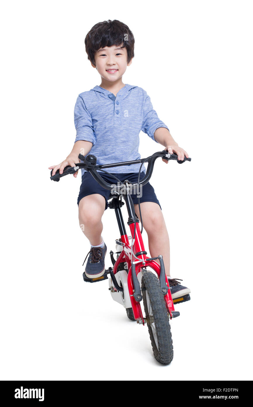 Fröhlicher Junge Reiten Fahrrad Stockfoto
