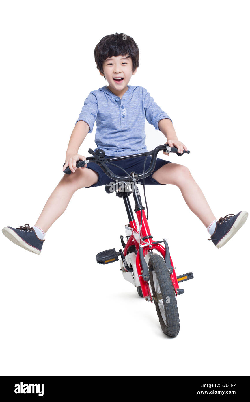 Fröhlicher Junge Reiten Fahrrad Stockfoto